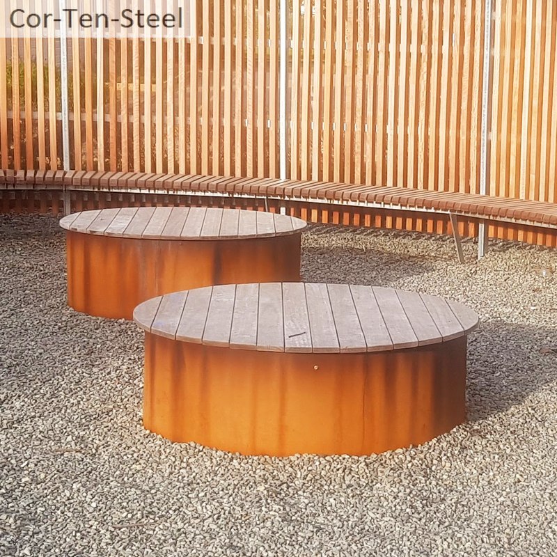 corten rings used as garden seating