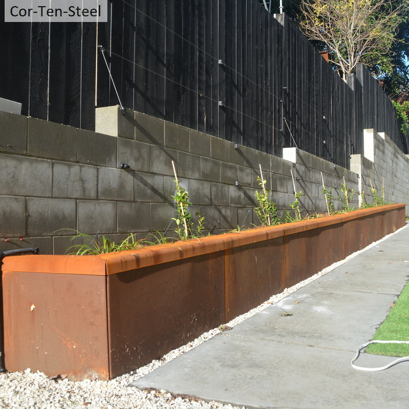 long corten retaing wall 600mm tall with capping