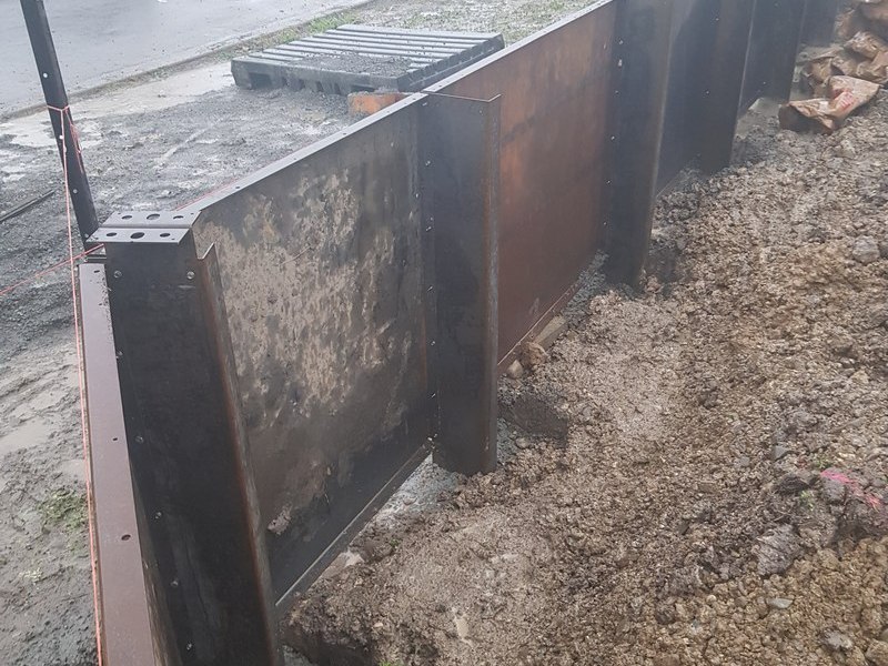 corten retaining wall and steel post assembly information