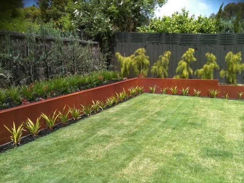 corten retaining wall 600mm tall in garden setting